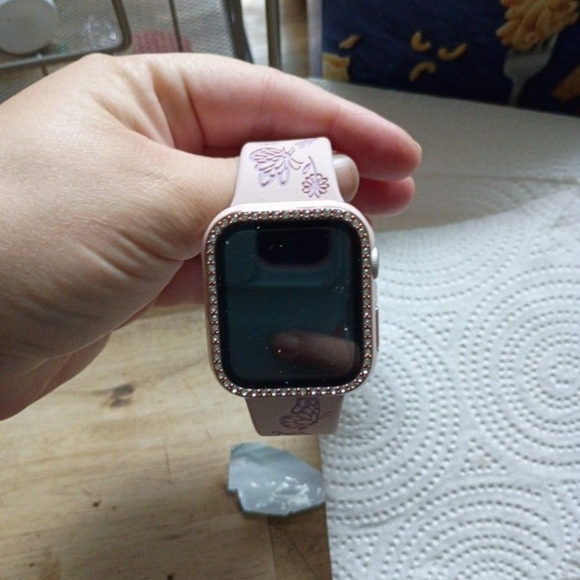 Pink Smartwatch with Sleek Design and Digital Display
